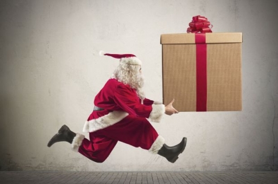 santa claus carrying courier parcel