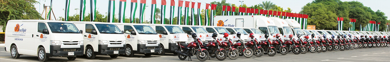 First FlightCourier delivery vehicles lined up side by side